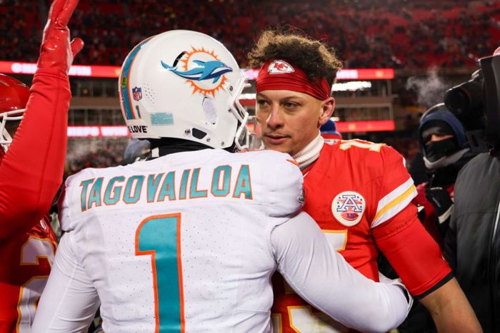 KANSAS CITY, MISSOURI - JANUARY 13: Patrick Mahomes #15 of the Kansas City Chiefs interacts with Tua Tagovailoa #1 of the Miami Dolphins after an NFL Super Wild Card Weekend playoff game at GEHA Field at Arrowhead Stadium on January 13, 2024 in Kansas City, Missouri. (Photo by Kara Durrette/Getty Images)